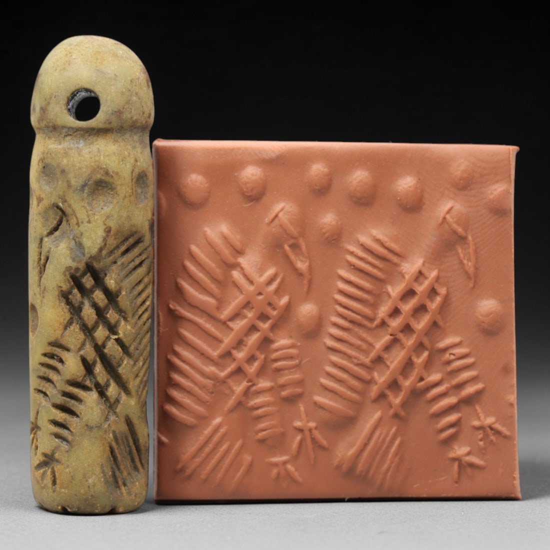 Ancient Serpentine Cylinder Seal - Mesopotamian, 53ZT: Carved from serpentine, this cylinder seal follows the classic cylindrical form of ancient Mesopotamian administrative and ritual artifacts. Attributed to the Bronze Age Mesopotamian cultures, this se