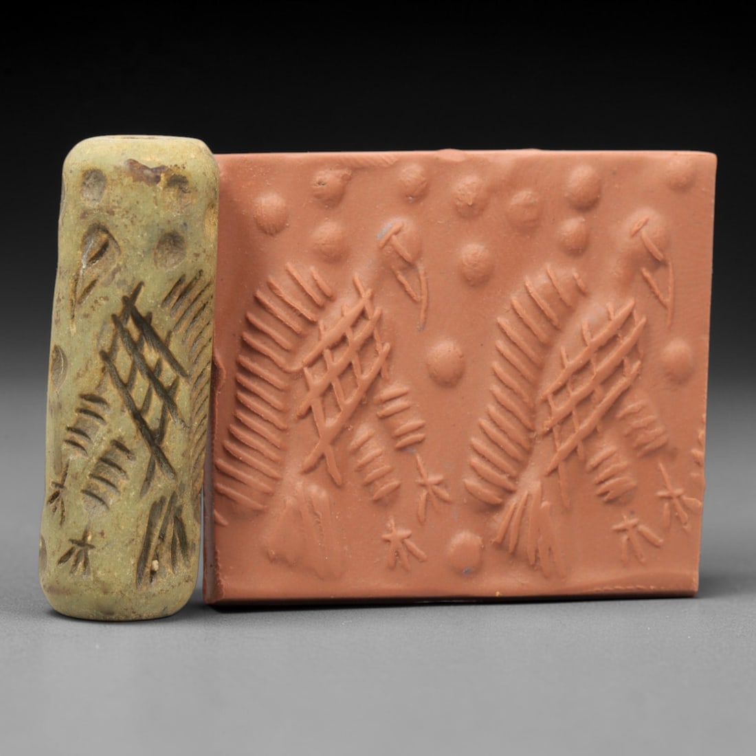 Ancient Serpentine Cylinder Seal - Mesopotamian, 58ZT: Carved from serpentine, this cylinder seal follows the classic cylindrical form of ancient Mesopotamian administrative and ritual artifacts. Attributed to the Bronze Age Mesopotamian cultures, this se
