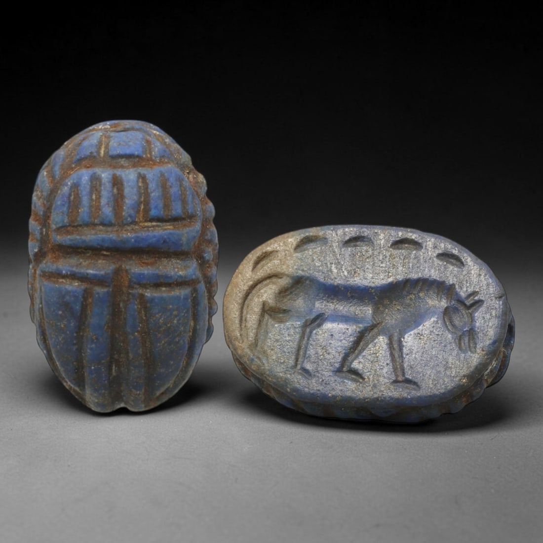 Ancient Lapis Lazuli Scarab - Near Eastern Zoomorphic Seal, 78AS: This artifact is hand-carved from lapis lazuli, utilizing traditional ancient lapidary techniques consistent with Near Eastern Bronze Age seal craftsmanship. The object takes the form of a scarab beet