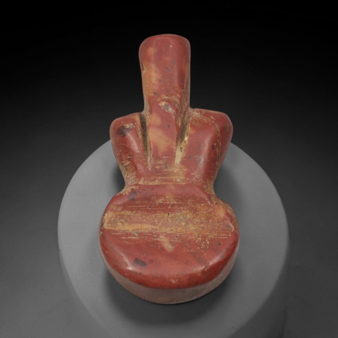 Ancient Red Stone Anthropomorphic Idol - Near Eastern Miniature Figurine, 13XQ: Carved from a striking, variegated red stone with natural cream and brown inclusions, this miniature idol depicts a stylized humanoid figure in the iconic minimalist style of ancient Near Eastern ritu