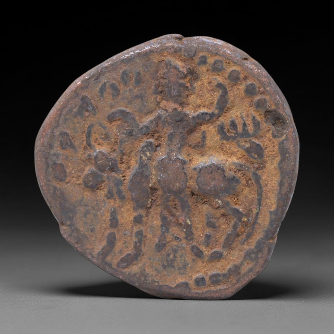 KUSHAN EMPIRE: Vasudeva I - Hindu Devotion Bronze Tetradrachm Coin, 195-230, 26mm, 10.2g, 4XS: Minted during the middle phase of Vasudeva I's reign (195-230 AD), this bronze tetradrachm stands as a tangible link to the religious and political identity of the late Kushan Empire. The obverse depi