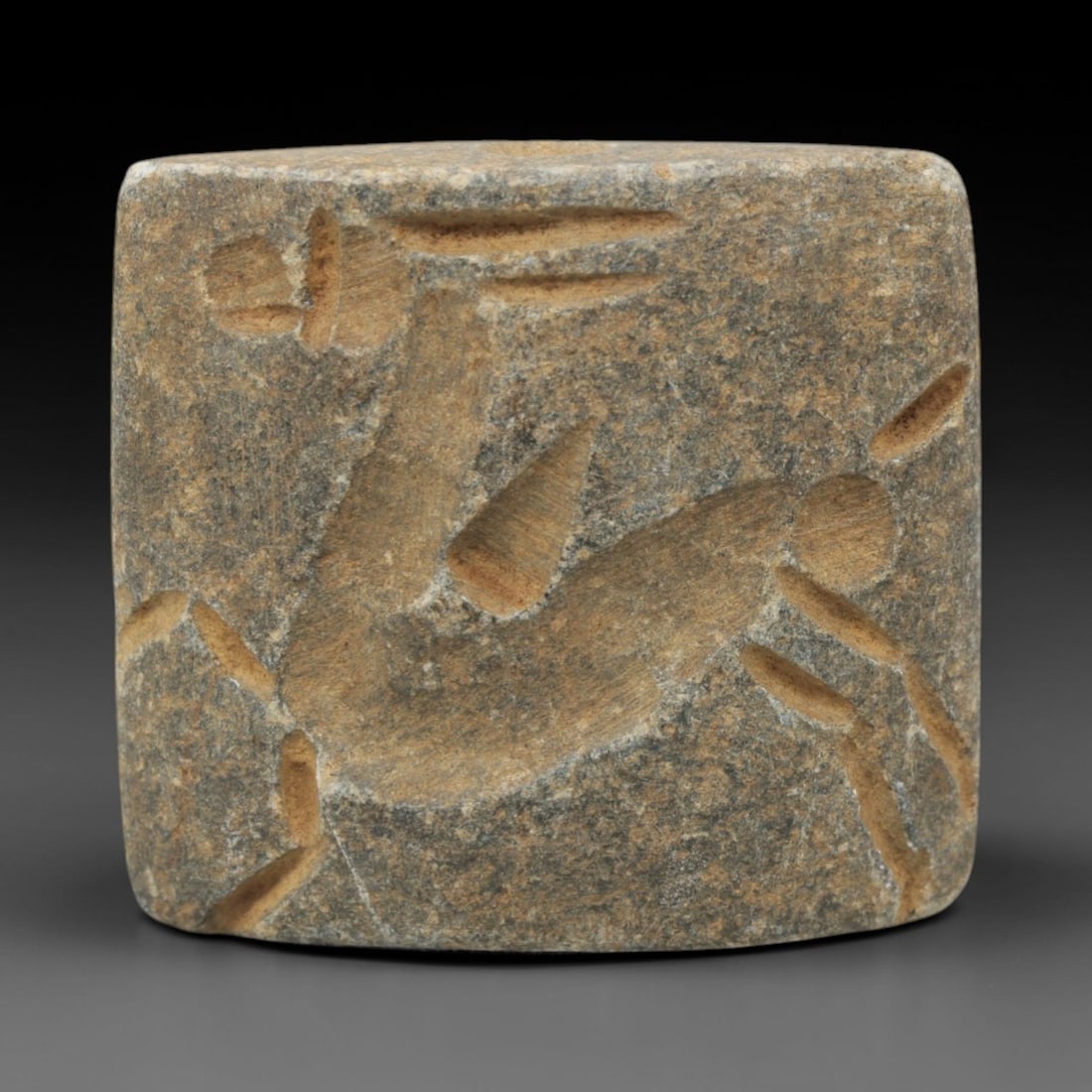 Ancient Steatite Double Convex Stamp Seal - Near Eastern Amulet, 13ZQ: Carved from steatite, this double convex stamp seal features a stylized human figure with incised linear detailing on both faces. The stone exhibits a soft, earthy patina with minor surface wear consi