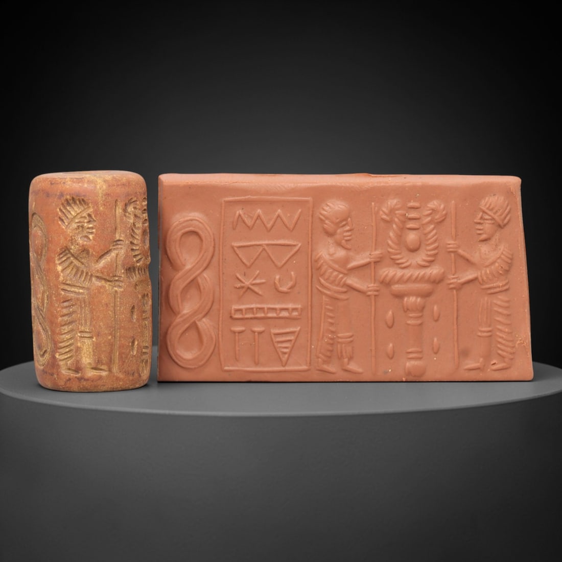 Ancient Steatite Cylinder Seal - Mesopotamian Administrative & Sacred Standard Scene, 11ZP: Carved from warm, terracotta-toned steatite, this ancient Mesopotamian cylinder seal depicts a formal administrative scene, executed with precise glyptic craftsmanship characteristic of the Neo-Assyri