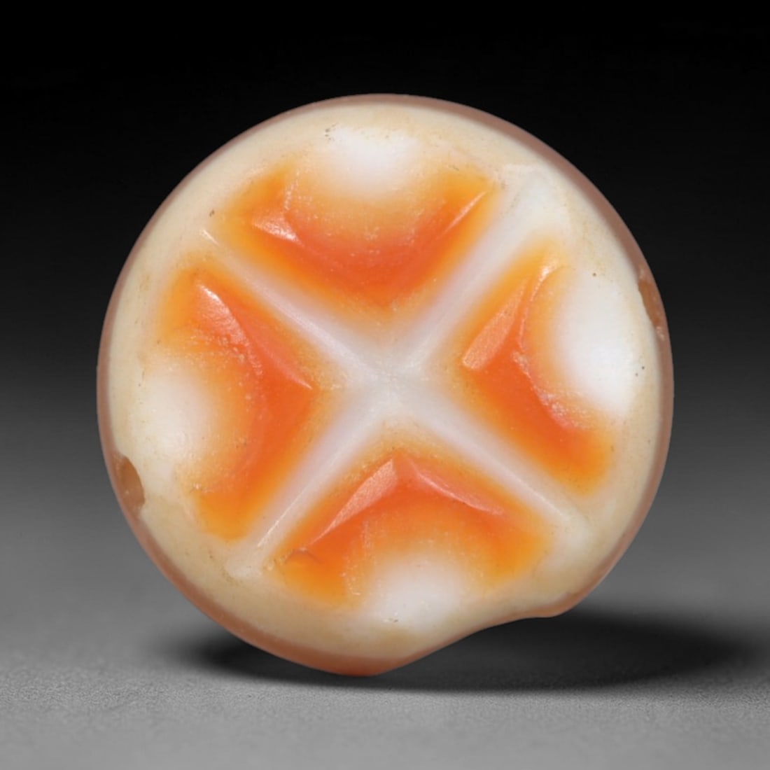 Antique Agate Cross Bead - Central Asian Gemstone Pendant, 17AR: Carved from banded agate with a creamy white base and warm orange inclusions, this bead features a symmetrical cross motif with four raised, faceted orange segments separated by crisp white linear div