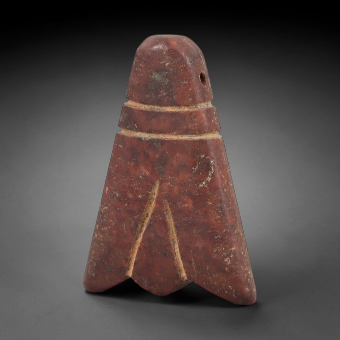 Ancient Egyptian Stone Amulet - Geometric Carved Pendant, 82AE: Carved from stone, this ancient Egyptian amulet features a geometric pattern with linear carvings, a design typical of protective amulets from the Late Period. The compact pendant has a suspension hol