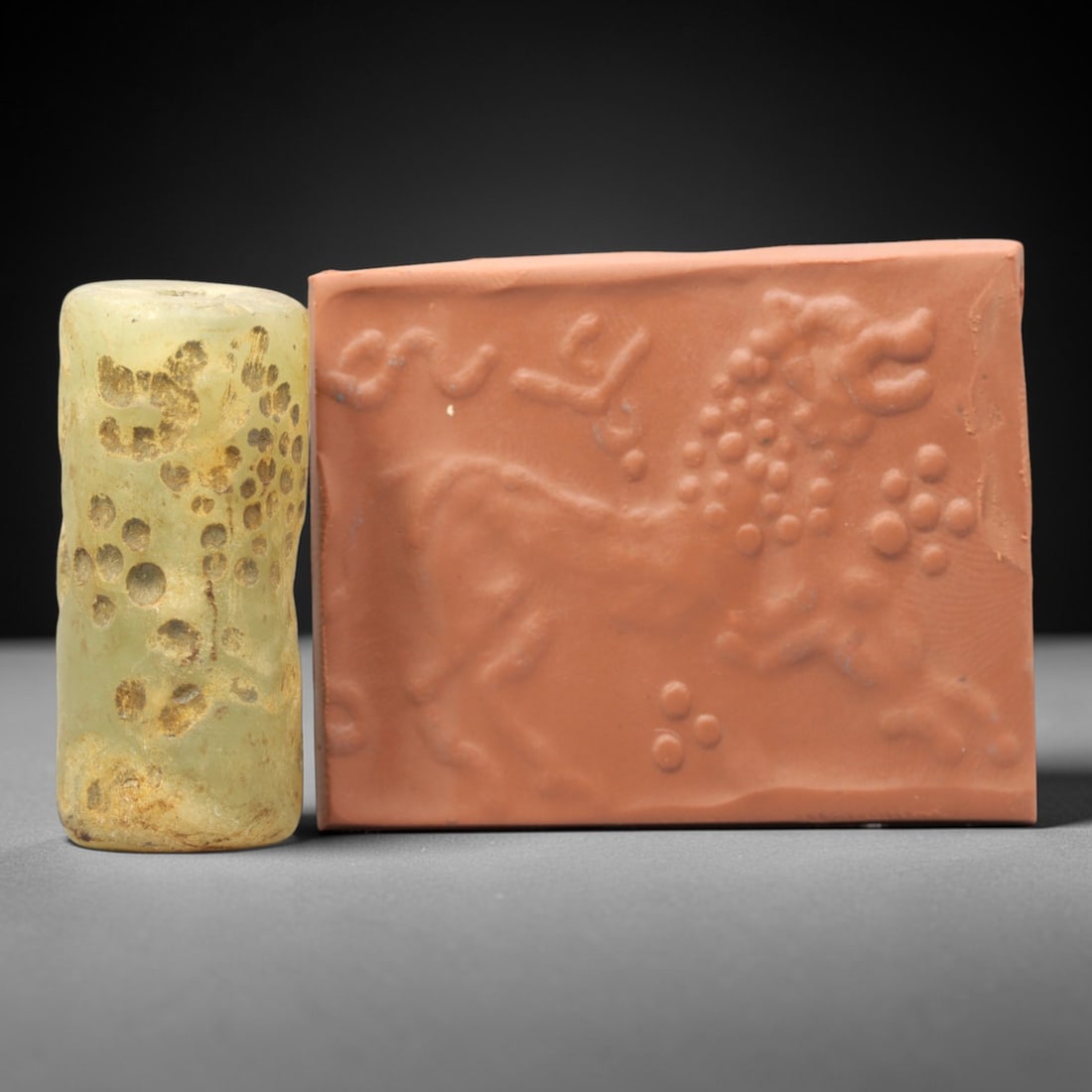 Ancient Serpentine Cylinder Seal - Mesopotamian, 56ZT: Carved from serpentine, this cylinder seal follows the classic cylindrical form of ancient Mesopotamian administrative and ritual artifacts. Attributed to the Bronze Age Mesopotamian cultures, this se