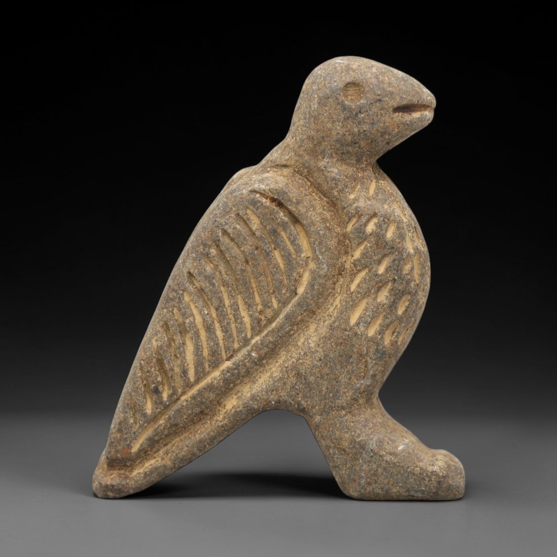 Ancient Stone Vulture Effigy Amulet - Near Eastern Zoomorphic Protective Figurine, 21ZR: This artifact is a carved stone vulture effigy amulet, executed in the stylized zoomorphic tradition of the ancient Near East. The amulet depicts a standing vulture with simplified anatomical features