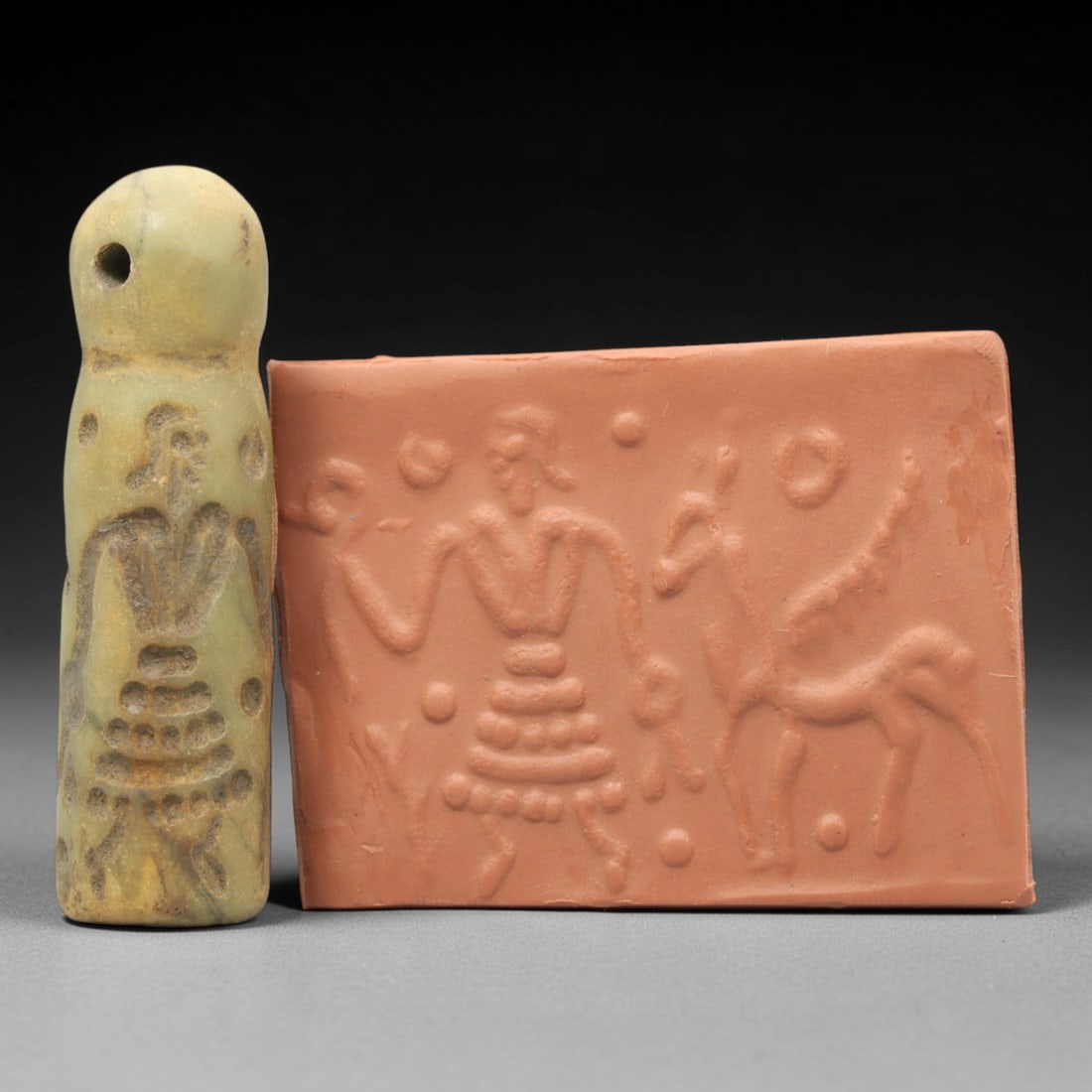 Ancient Serpentine Cylinder Seal - Mesopotamian, 44ZT: Carved from serpentine, this cylinder seal follows the classic cylindrical form of ancient Mesopotamian administrative and ritual artifacts. Attributed to the Bronze Age Mesopotamian cultures, this se