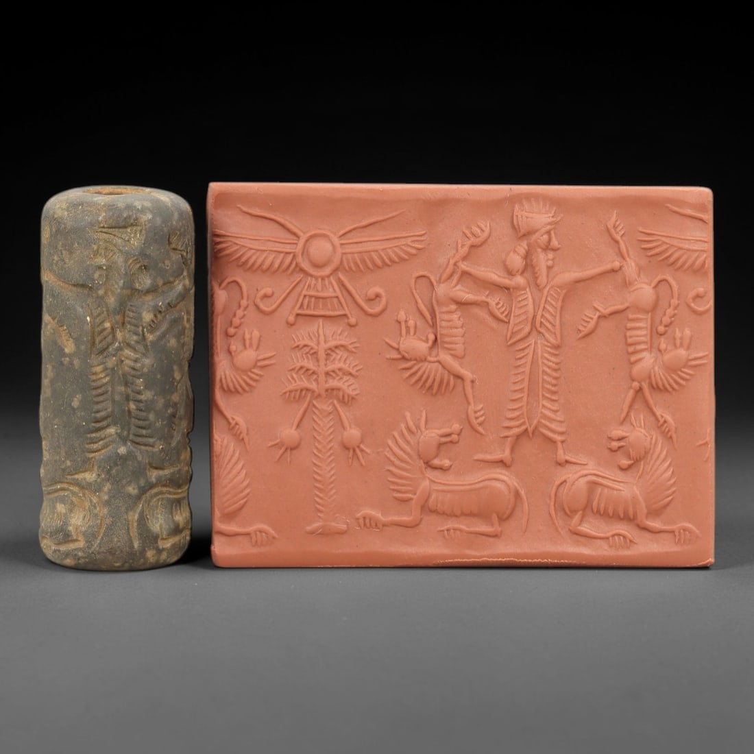 Ancient Steatite Cylinder Seal - Mesopotamian Mythological Scene, 2ZP: Carved from weathered steatite, this ancient Mesopotamian cylinder seal depicts a complex mythological scene, executed with meticulous glyptic craftsmanship characteristic of Mesopotamian Bronze Age a