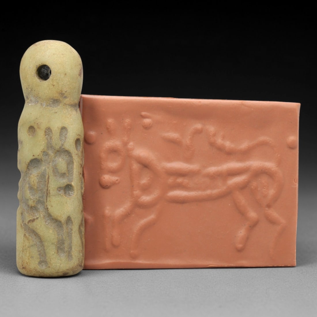 Ancient Serpentine Cylinder Seal - Mesopotamian, 59ZT: Carved from serpentine, this cylinder seal follows the classic cylindrical form of ancient Mesopotamian administrative and ritual artifacts. Attributed to the Bronze Age Mesopotamian cultures, this se