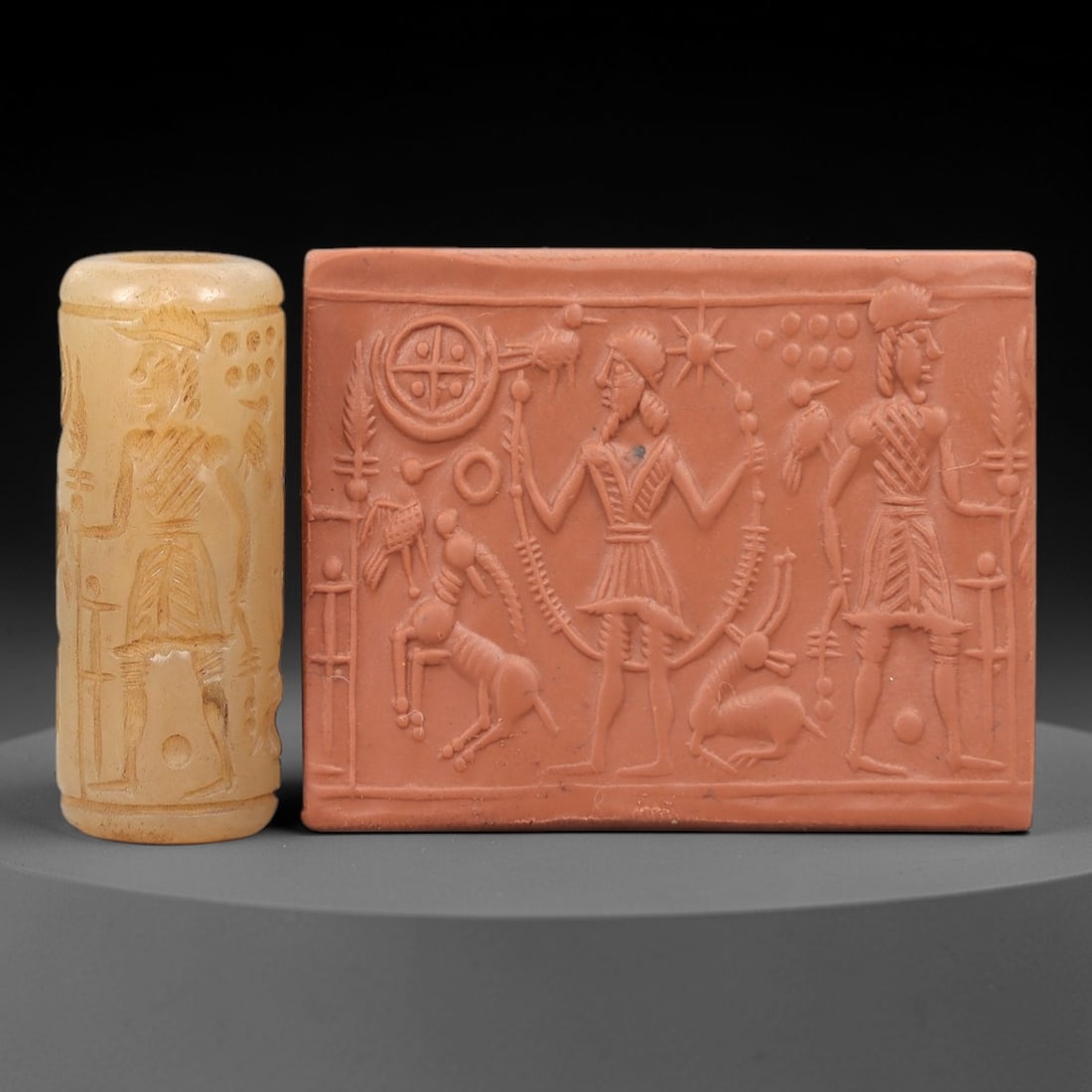 Ancient Chalcedony Cylinder Seal - Mesopotamian Divine Pastoral Ritual Scene, 18ZP: Carved from pale, creamy chalcedony, this ancient cylinder seal depicts a serene divine pastoral ritual scene, executed with meticulous glyptic craftsmanship characteristic of the Neo-Assyrian period.