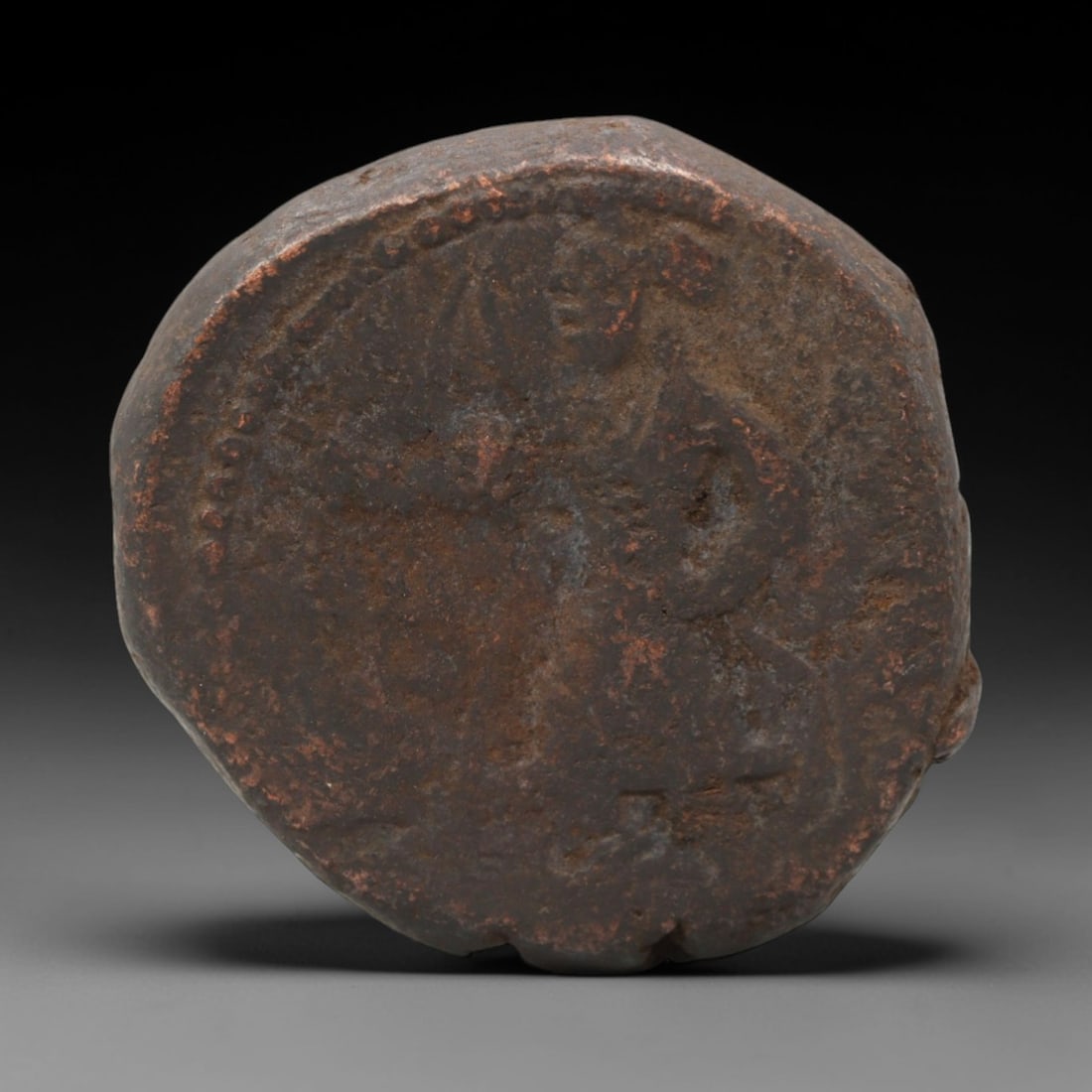 KUSHAN EMPIRE: Royal Devotion - Bronze Coin, 2nd-3rd Century CE, 26x25mm, 16.3g, 87AJ: This substantial bronze coin from the Kushan Empire exemplifies the dynasty's fusion of Persian, Greek, and Indian artistic traditions. The obverse displays a royal bust in profile with a distinctive