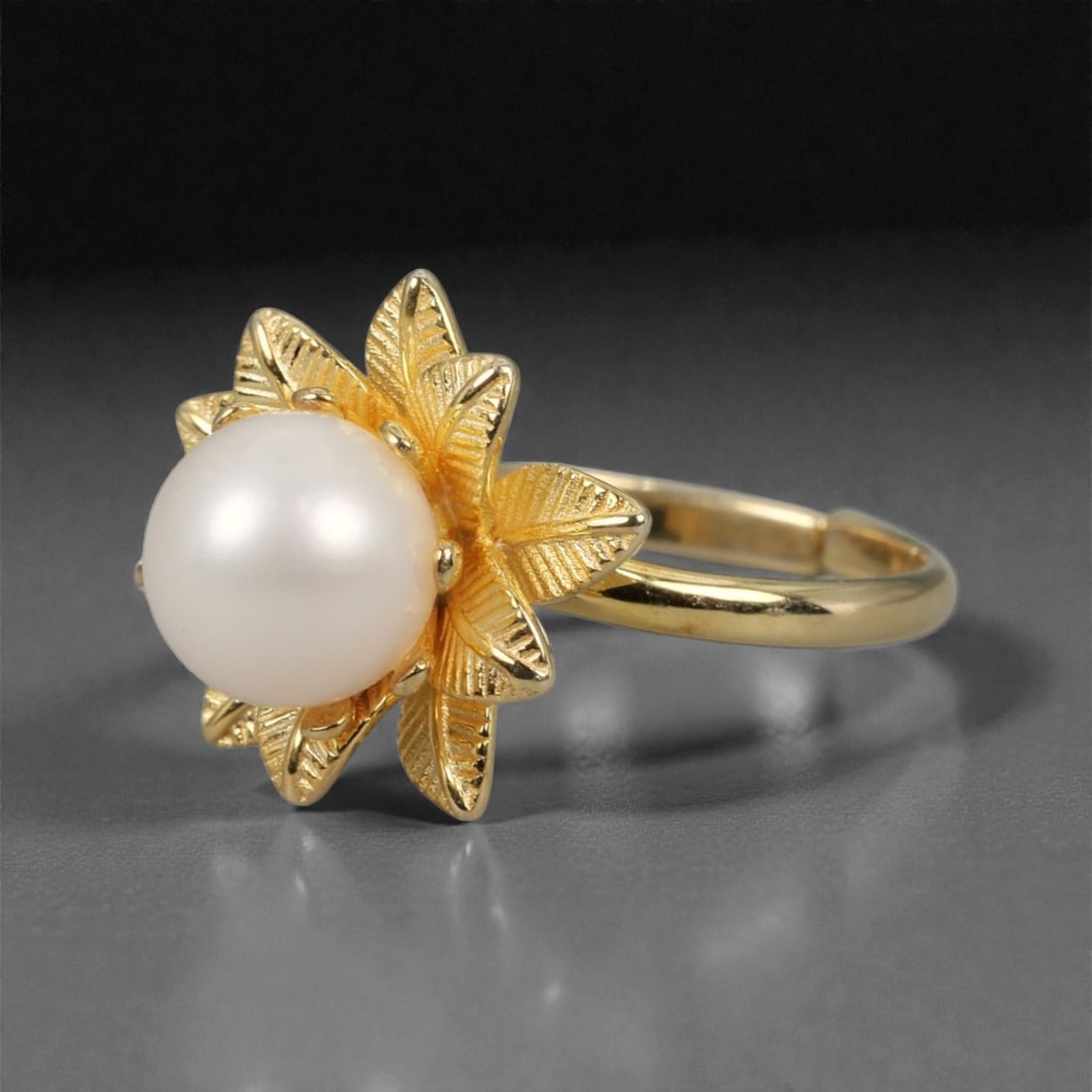 Golden Floral Pearl Ring - Natural Cultured Pearl - Size 6 US - 15 x 14 mm - 3.54 Grams, 48XK: This elegant ring features a luminous white cultured pearl cradled at the center of a gold-tone floral motif, with delicately engraved petals radiating outward in a sunburst design. The warm metallic
