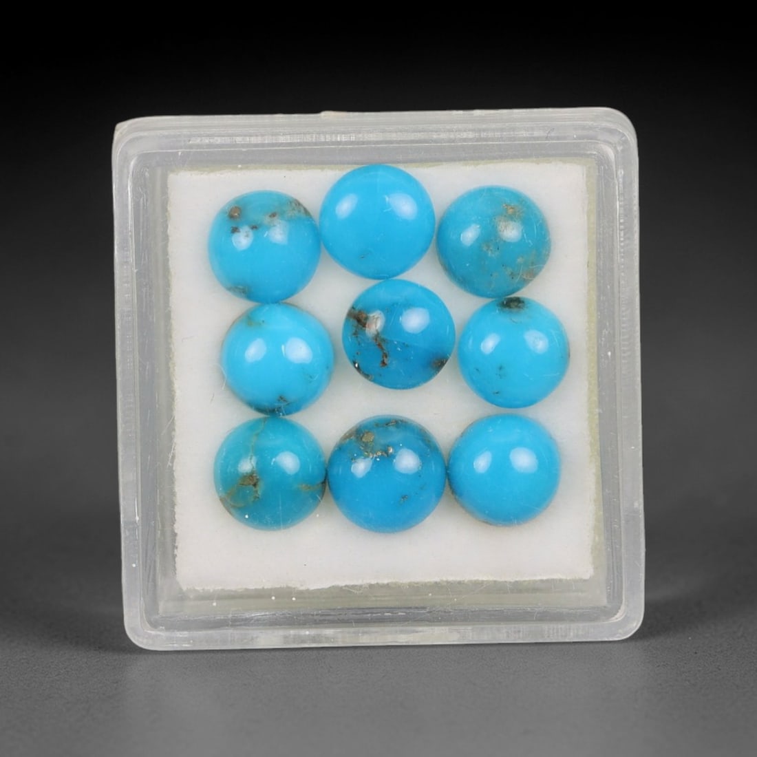 6.39 Carats Natural Sleeping Beauty Turquoise Round Cabochon Parcel - Natural Arizona Stones, 51XP: This curated parcel of eight round cabochon Sleeping Beauty turquoise gems showcases a vivid, uniform sky-blue hue, with subtle natural matrix inclusions that highlight their authentic, unaltered