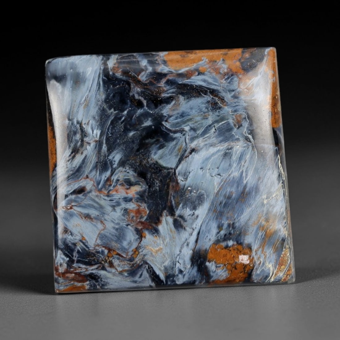 15.77 Carats Pietersite Square Cabochon - Natural Namibian Stone, 30XP: This magnificent square cabochon pietersite dazzles with a dramatic, swirling tapestry of deep indigo, slate-blue, and burnt amber hues, interwoven with silvery chatoyant threads that catch the light