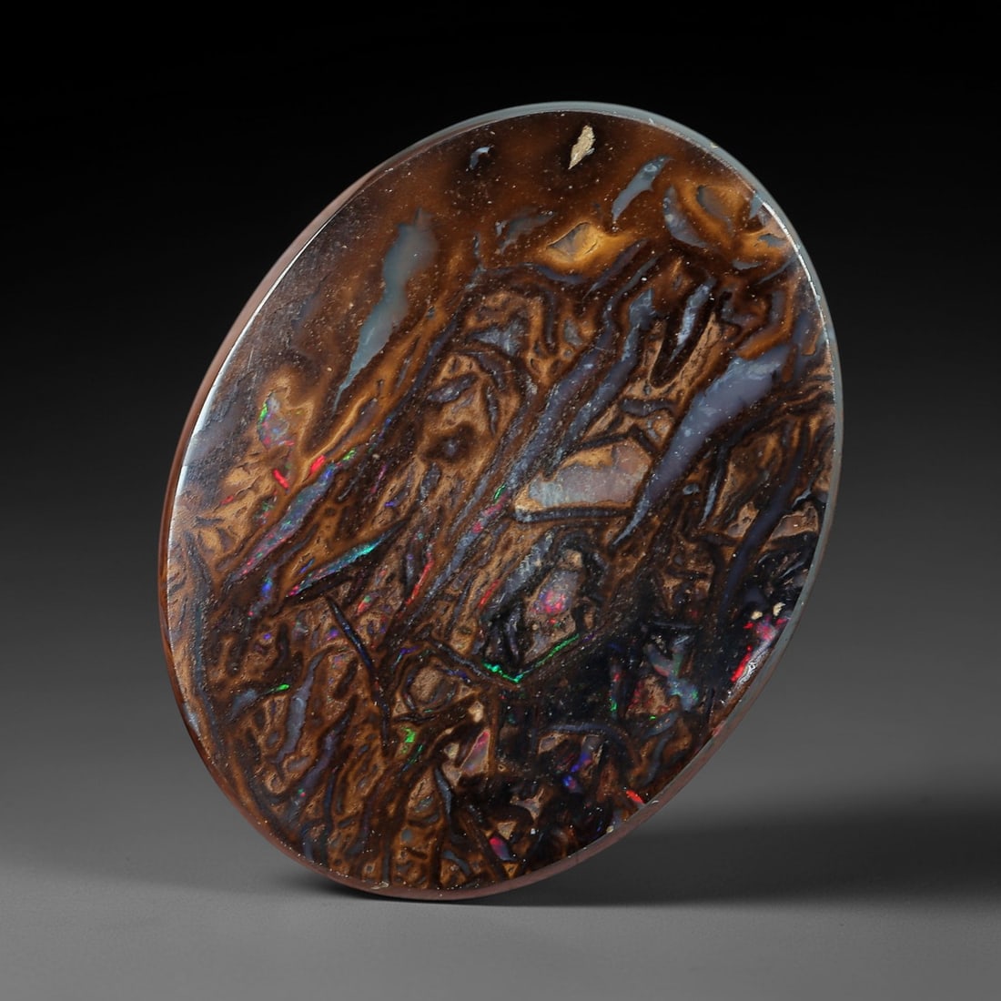 5.24 Carats Koroit Yowah Opal Cabochon - Natural Australian Single Stone, 73XL: This substantial Koroit Yowah opal cabochon, measuring 13.7x10.5mm, features a dense, textured ironstone matrix in layered tones of deep chocolate brown, warm tan, and jet black. The stone's internal