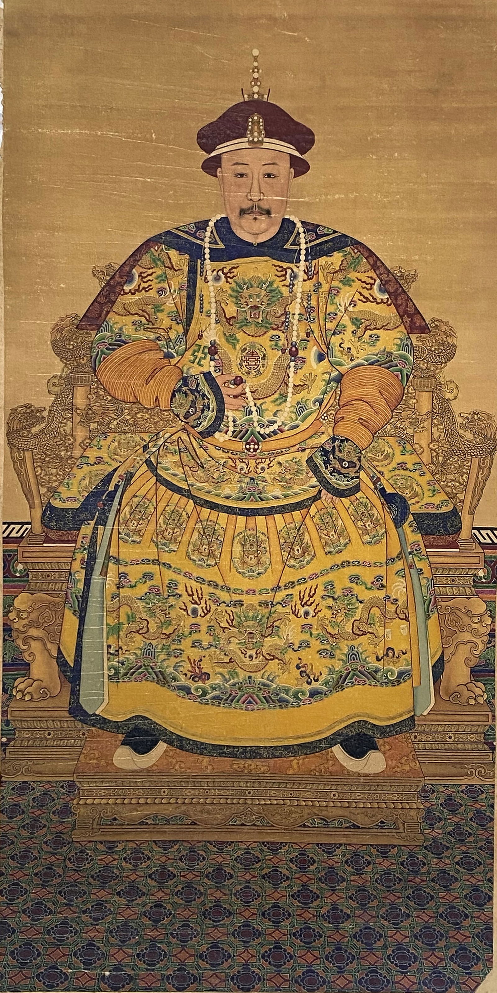 A Chinese Ink and Color Art Print of the Jiaqing Emperor, 20th Century, 10FK: Produced using fine art printing processes on aged paper stock, the work is an ink and color art print executed in the traditional Chinese imperial portrait idiom. The composition features the Jiaqing