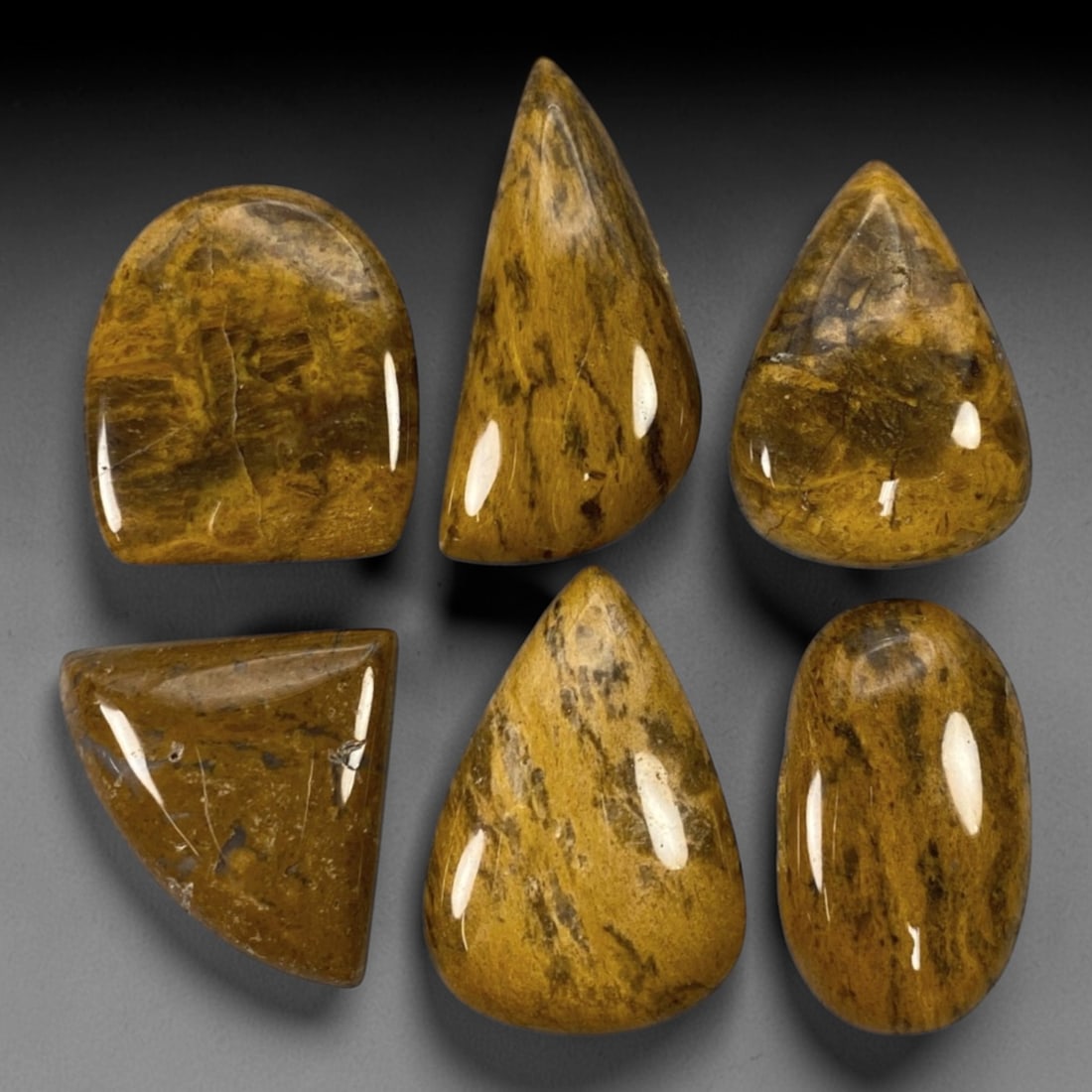 200.17 Carats Camel Jasper Statement Cabochon Parcel - Natural Loose Gemstones, 99ZL: This exceptional parcel of six handcrafted Camel Jasper cabochons, weighing a total of 200.17 carats with individual dimensions spanning 3.0 to 3.8 cm, embodies the rugged elegance of this distinctive