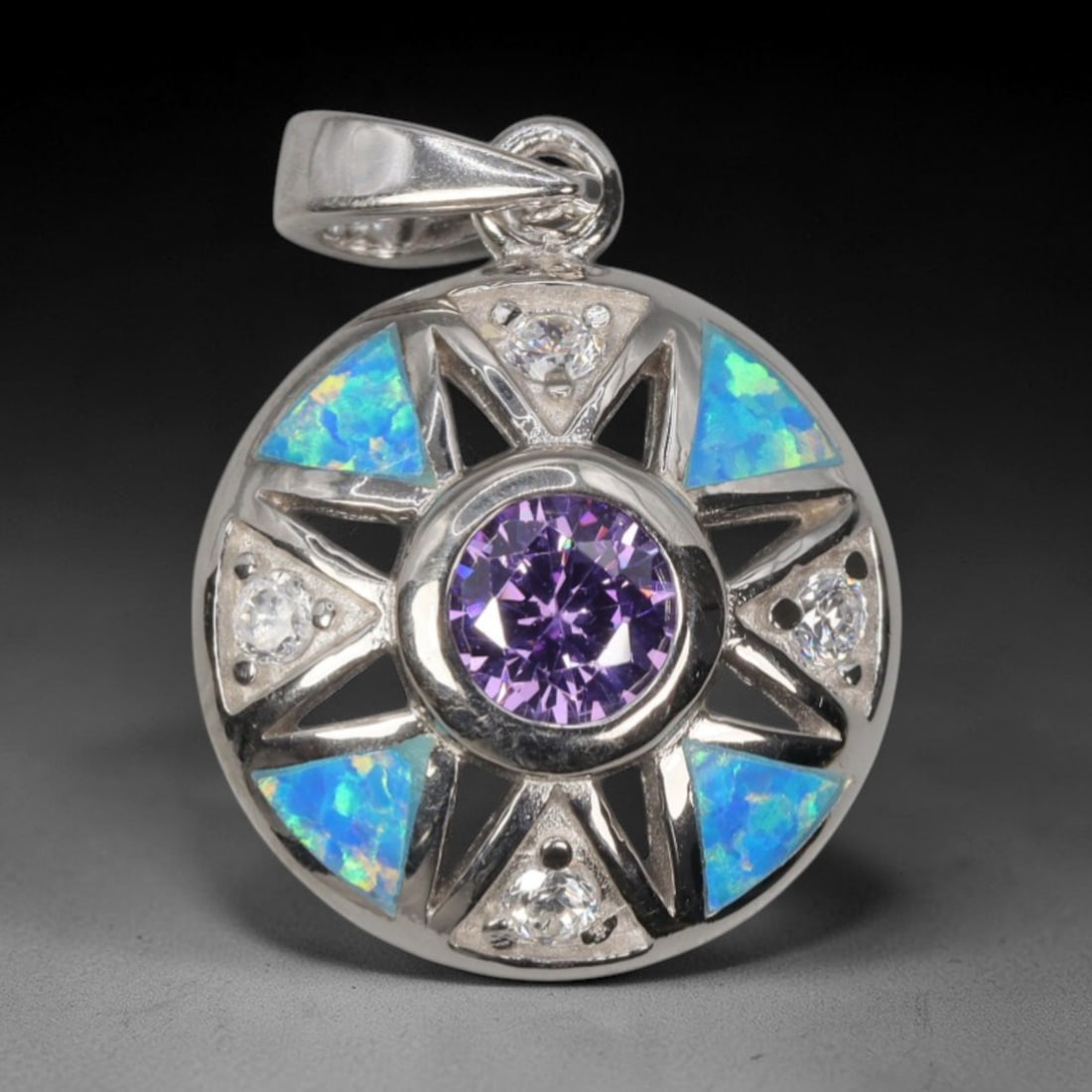 4.12g 925 Sterling Silver Compass Pendant - Simulated Opal Amethyst, 6D: Crafted from stamped 925 sterling silver, this pendant features a circular compass-inspired design with polished openwork detailing. A large round-cut deep purple amethyst-colored gemstone is secured