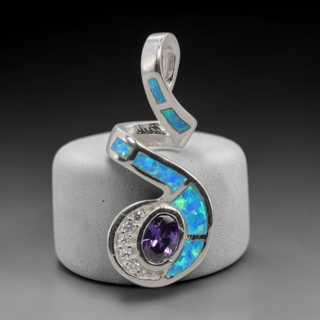 3.96g 925 Sterling Silver Spiral Pendant - Simulated Opal Amethyst, 40D: Crafted from stamped 925 sterling silver, this pendant features a dynamic spiral openwork design. Five rectangular segments of simulated opal are inlaid along the curved silver bands, exhibiting vivid