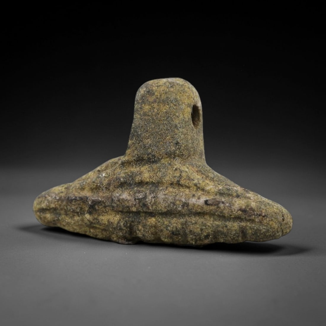 Ancient Serpentine Winged Amulet - Near Eastern Figurine, 11AJ: Carved from mottled earthy-toned serpentine with natural mineral inclusions, this amulet is formed as a stylized winged motif with a central vertical stem and two broad horizontal wing extensions, fea