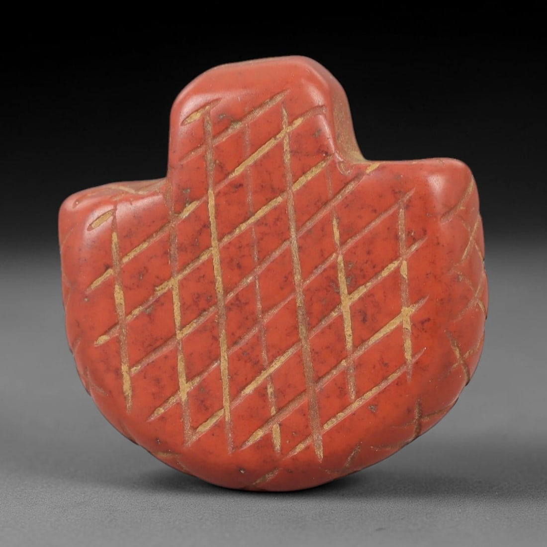 Ancient Egyptian Stone Amulet - Geometric Grid Carving, 74AE: Carved from stone, this ancient Egyptian amulet features a geometric grid pattern incised across its surface, a design typical of protective amulets from the Late Period of ancient Egypt (c. 760-332 B