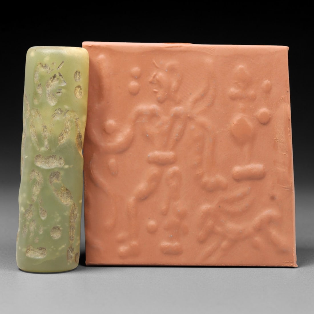 Ancient Serpentine Cylinder Seal - Mesopotamian, 45ZT: Carved from serpentine, this cylinder seal follows the classic cylindrical form of ancient Mesopotamian administrative and ritual artifacts. Attributed to the Bronze Age Mesopotamian cultures, this se