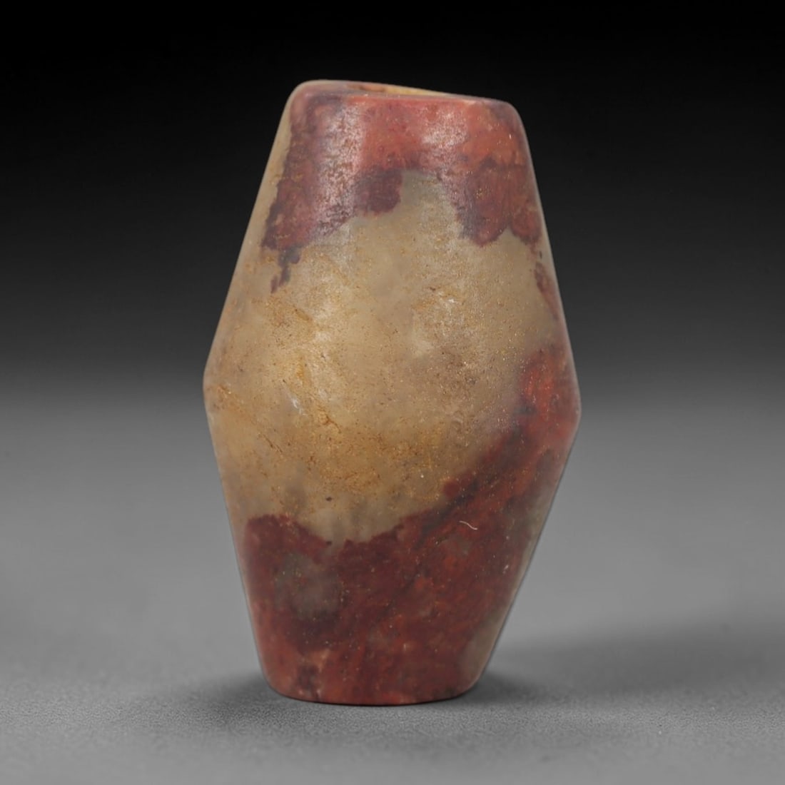 Ancient Egyptian Stone Cylindrical Amulet - Steatite Carving, 23AG: Carved from steatite stone, this ancient Egyptian cylindrical amulet features a compact, elongated form with a central perforation for suspension, typical of protective amulets from the Late Period (c