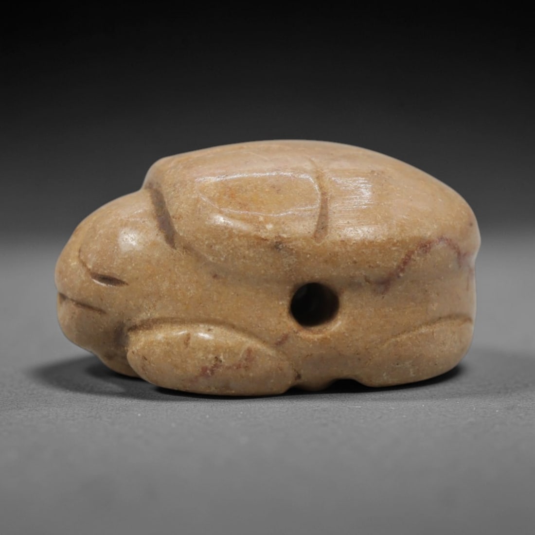 Ancient Steatite Turtle Amulet - Near Eastern Carved Pendant, 24ZQ: Carved from steatite stone, this ancient Near Eastern turtle amulet features a stylized turtle form with incised detailing and a suspension hole at the top, designed for wearable protection. The compa