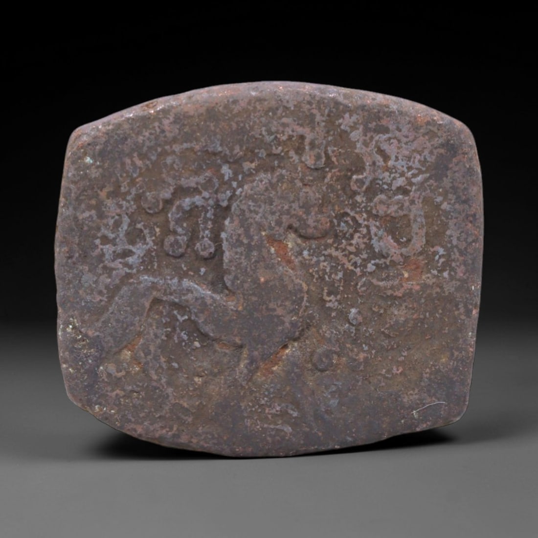 NORTHERN SATRAPS: Scythian Sovereignty Copper Karshapana Coin, 1-20 CE, 20mm, 6.45g, 2XS: This copper Karshapana from the reign of Kharahostes, ruler of the Northern Satraps of Chach, is a rare artifact of Indo-Scythian rule in early South Asia. The obverse bears a stylized royal portrait,