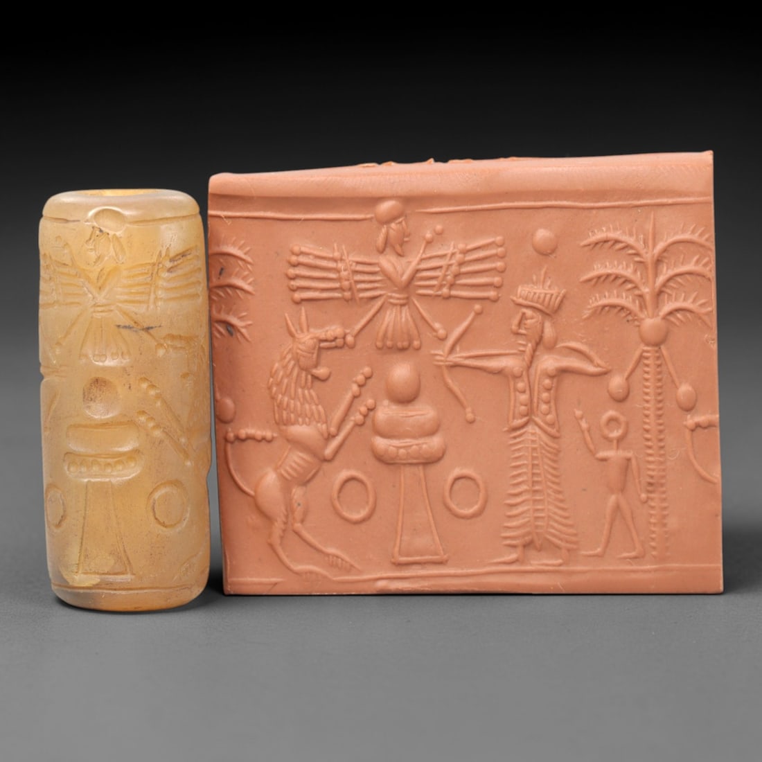 Ancient Chalcedony Cylinder Seal - Mesopotamian Royal Heroic & Divine Apotropaic Scene, 13ZP: Carved from warm, honey-toned chalcedony, this ancient cylinder seal depicts a dynamic heroic and divine apotropaic scene, executed with meticulous glyptic craftsmanship characteristic of the Neo-Assy