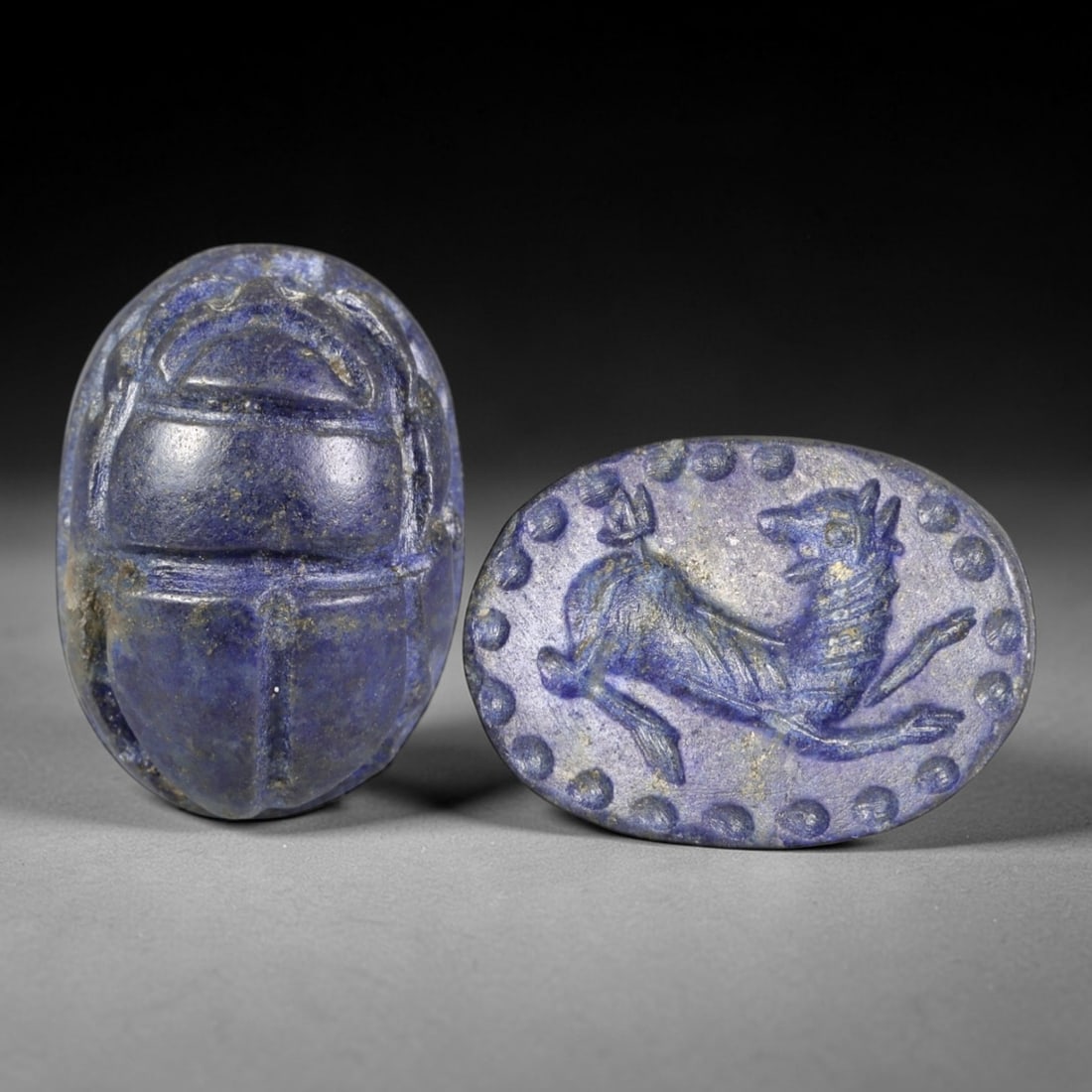Ancient Lapis Lazuli Scarab - Near Eastern Zoomorphic Seal, 75AS: This artifact is hand-carved from lapis lazuli, utilizing traditional ancient lapidary techniques consistent with Near Eastern Bronze Age seal craftsmanship. The object takes the form of a scarab beet
