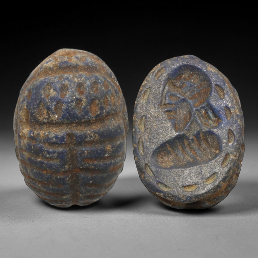 Ancient Lapis Lazuli Scarab - Near Eastern Figural Seal, 35XT: This artifact is hand-carved from lapis lazuli, employing traditional ancient lapidary techniques consistent with Near Eastern Bronze Age seal craftsmanship. The object takes the form of a scarab beet