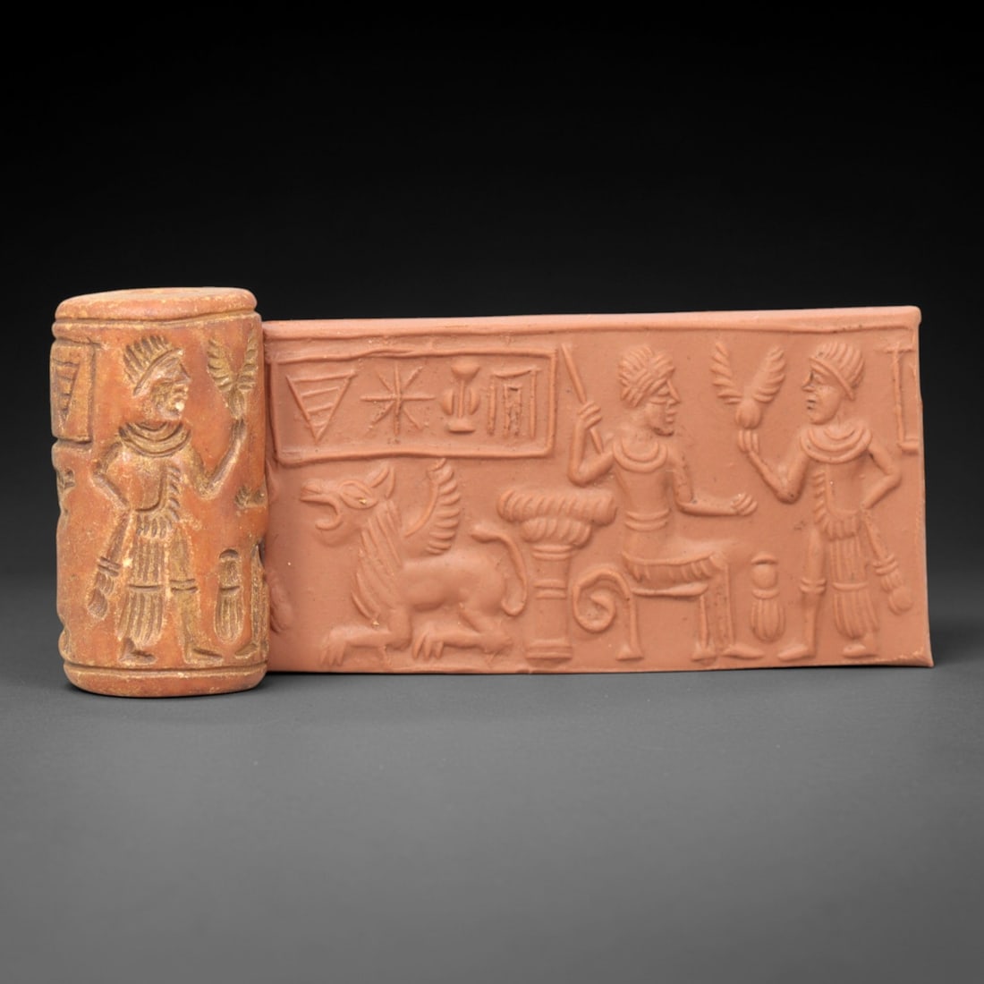 Ancient Steatite Cylinder Seal - Mesopotamian Administrative Ritual & Griffin Scene, 15ZP: Carved from warm, terracotta-toned steatite, this ancient Mesopotamian cylinder seal depicts a formal administrative ritual scene, executed with meticulous glyptic craftsmanship characteristic of the