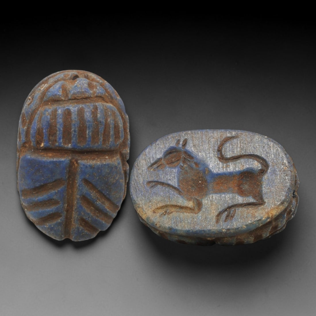 Ancient Lapis Lazuli Scarab - Near Eastern Zoomorphic Seal, 39XT: This artifact is hand-carved from lapis lazuli, utilizing traditional ancient lapidary techniques consistent with Near Eastern Bronze Age seal craftsmanship. The object takes the form of a scarab beet