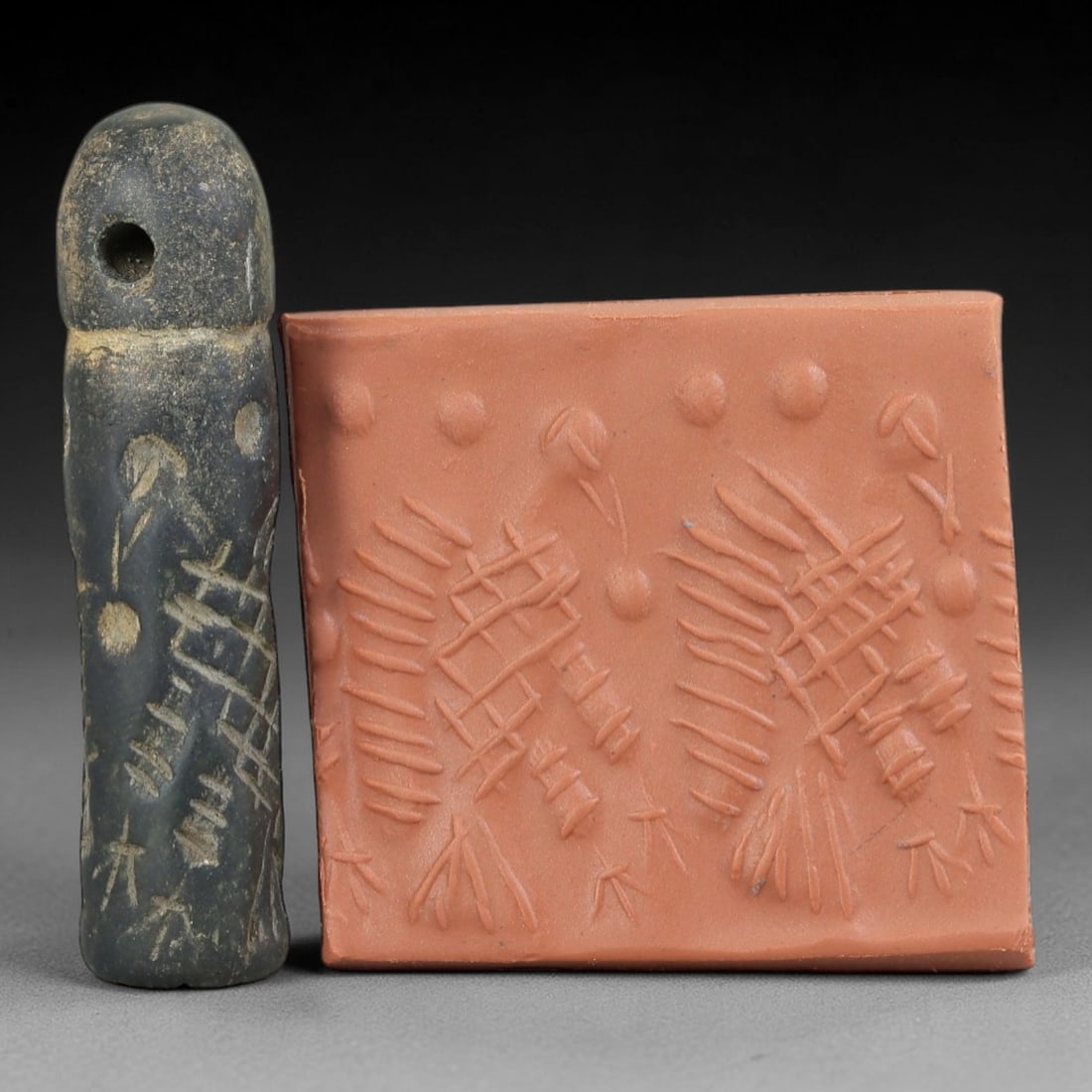 Ancient Serpentine Cylinder Seal - Mesopotamian Vulture Motif, 71FX: Carved from serpentine, this cylinder seal exhibits the classic cylindrical form of ancient Mesopotamian ritual and administrative artifacts. Its surface is intricately carved with a prominent vulture