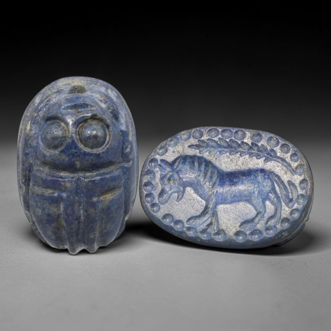 Ancient Lapis Lazuli Scarab - Near Eastern Zoomorphic Seal, 22XT: This artifact is hand-carved from lapis lazuli, utilizing traditional ancient lapidary techniques consistent with Near Eastern Bronze Age seal craftsmanship. The object takes the form of a scarab beet