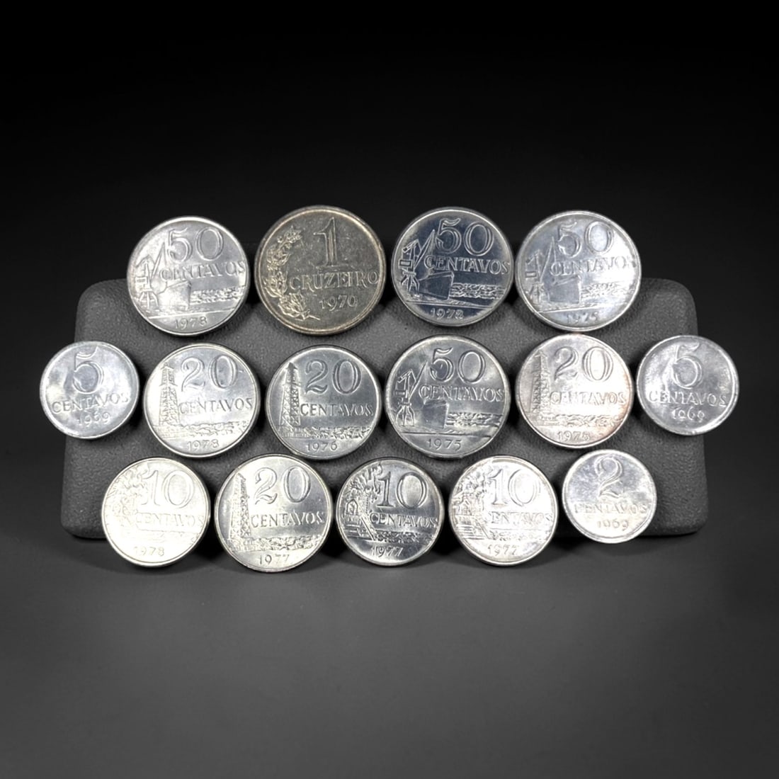 BRAZIL: Economic Transition & National Identity - 15-Piece Coins Set, 1969-1978, 20-29mm, 30ZJ: This 15-Piece Coins Set of Brazilian coins, minted between 1969 and 1978, encapsulates a pivotal era of economic transition and national identity in South America's largest nation. Ranging from 20 to