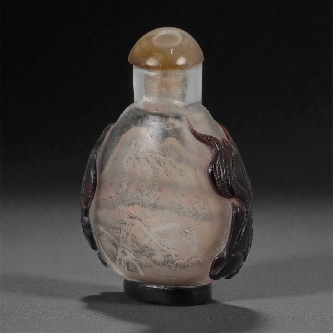 A Chinese Glass Inside-Painted Snuff Bottle, 20th Century, 91FG: Blown from translucent glass and hollowed through the mouth, the snuff bottle is formed with a rounded ovoid body rising to a short cylindrical neck with a flat lip. The interior is decorated with an
