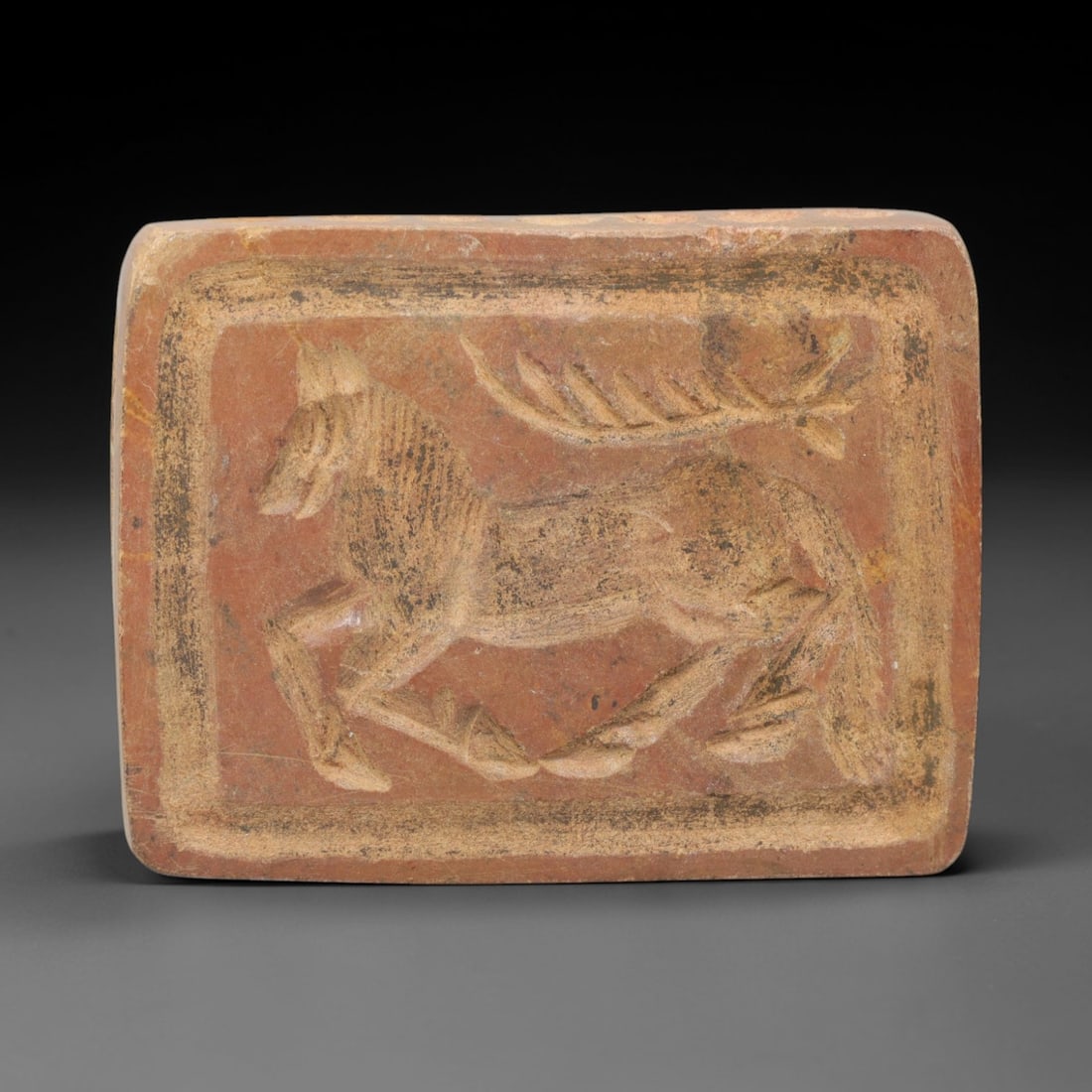 Ancient Limestone Double-Convex Seal - Near Eastern Animal Motif, 68ZQ: Carved from limestone, this ancient Near Eastern double-convex seal features a raised relief animal motif on one face and geometric ornamentation on the other, typical of small administrative or ritua