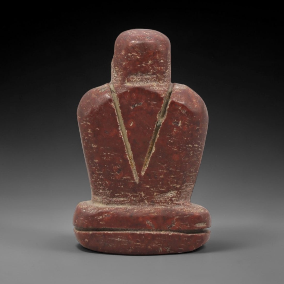 Ancient Egyptian Red Stone Tyet (Isis Knot) Amulet - Carved Pendant Figure, 19ZV: This amulet is carved from a rich, deep red stone with natural mineral speckling and patination, likely brecciated jasper or red steatite, featuring the iconic tyet (Isis knot) form. The piece consist