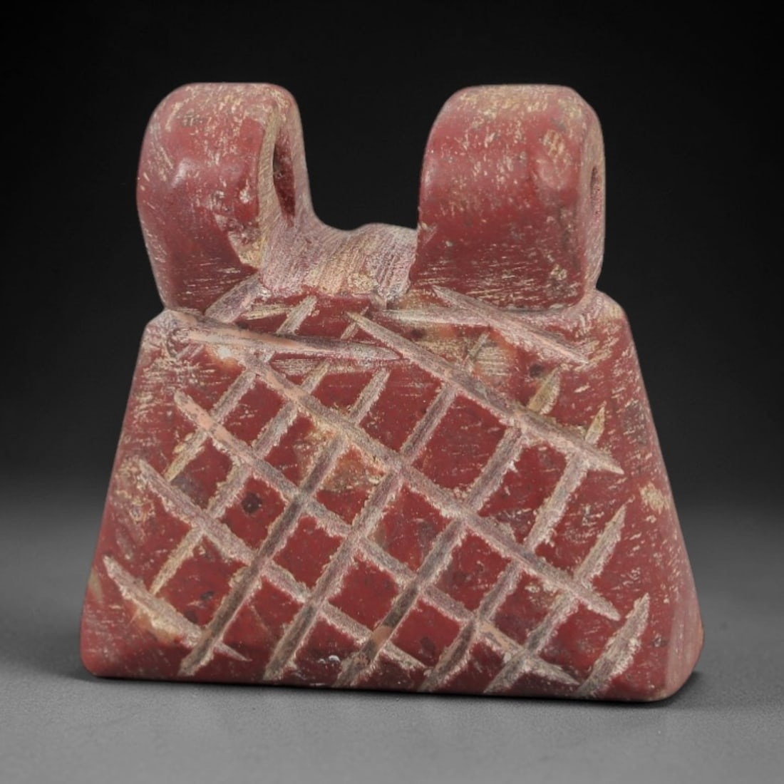 Ancient Egyptian Stone Amulet - Geometric Grid Carved Pendant, 76AE: Carved from stone, this ancient Egyptian amulet features a geometric grid pattern on its surface, a design typical of protective amulets from the Late Period. The compact pendant has a suspension hole