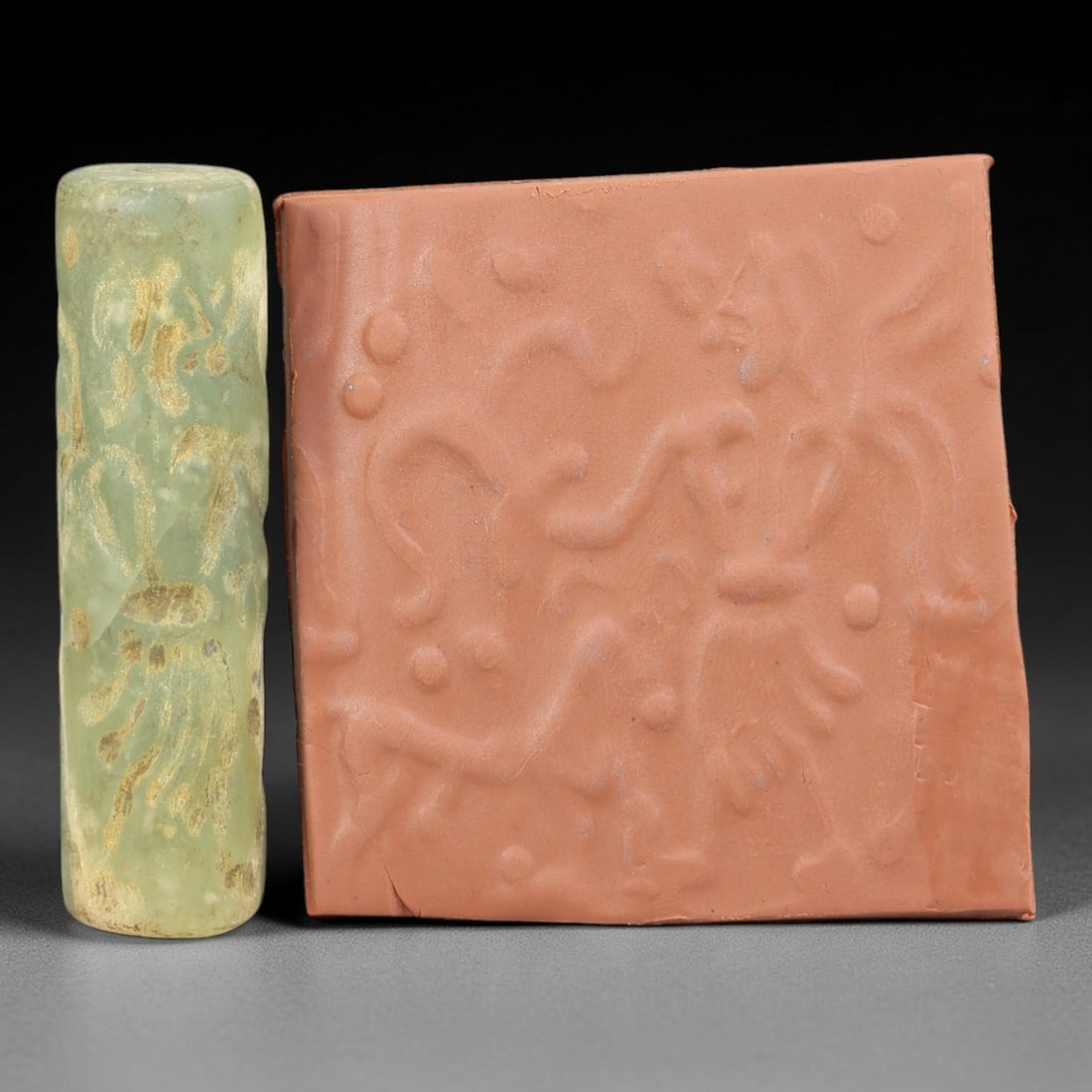 Ancient Serpentine Cylinder Seal - Mesopotamian, 80FX: Carved from serpentine, this cylinder seal follows the classic cylindrical form of ancient Mesopotamian administrative and ritual artifacts. Attributed to the Bronze Age Mesopotamian cultures, this se