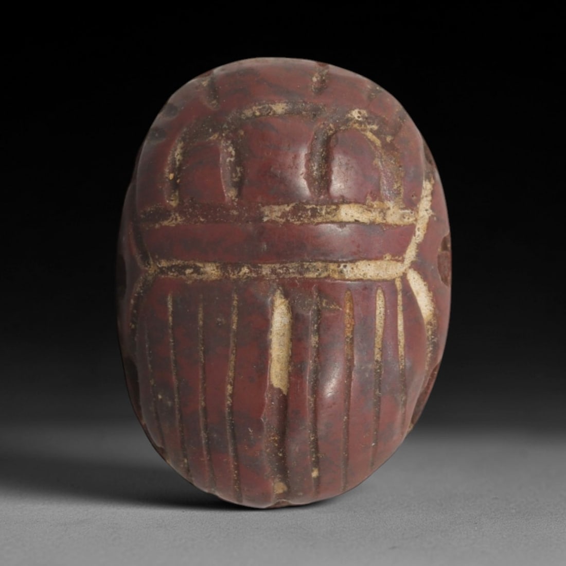 Ancient Red Stone Scarab Amulet - Egyptian Pendant, 78XP: Carved from rich, deep red stone, this amulet takes the form of a classic Egyptian scarab beetle, a powerful symbol of rebirth, protection, and divine favor in ancient Egyptian and later Mediterranean
