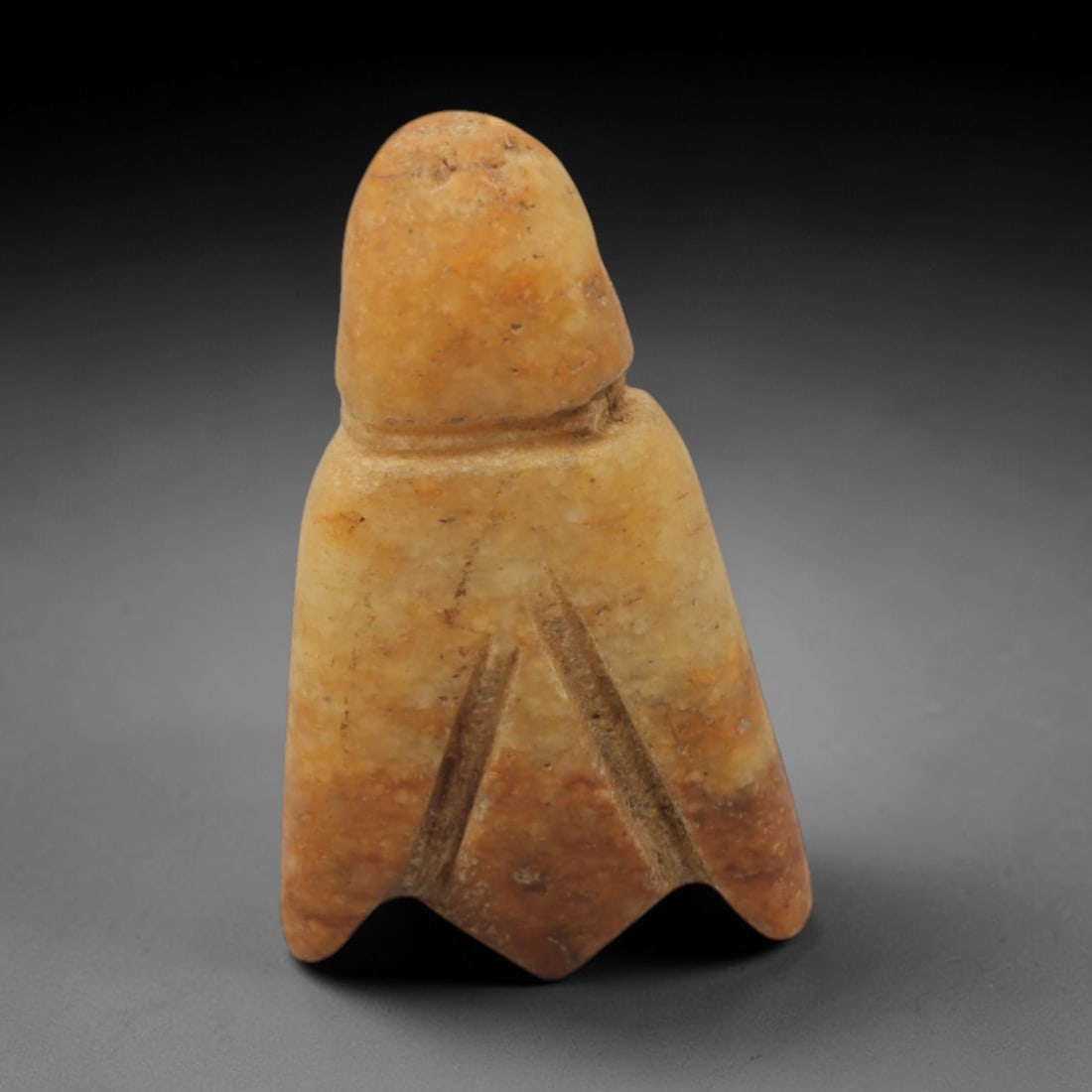 Ancient Stone Fly - Egyptian Amulet Pendant, 48XR: Carved from warm orange-brown stone, this amulet depicts a stylized fly with a domed head, narrow neck, and broad, wing-like lower body terminating in a split tail. The form and iconography are charac
