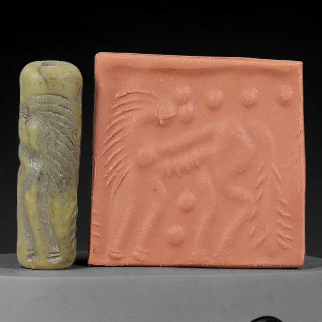 Ancient Serpentine Cylinder Seal - Mesopotamian, 61FX: Carved from serpentine, this cylinder seal follows the classic cylindrical form of ancient Mesopotamian administrative and ritual artifacts. Attributed to the Bronze Age Mesopotamian cultures, this se