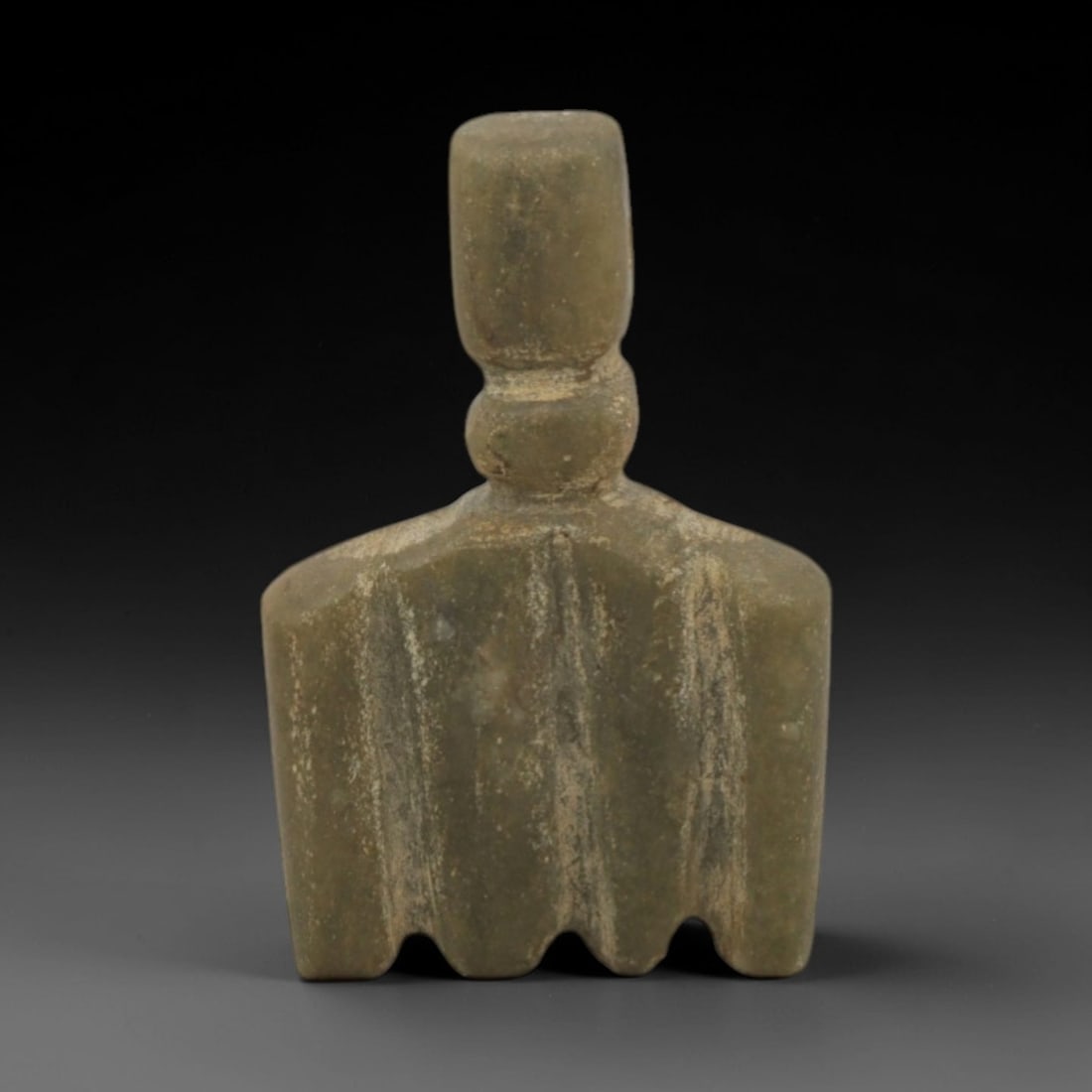 Ancient Stone Was Scepter Amulet - Egyptian Pendant, 73XQ: Carved from a mottled green stone, this amulet takes the form of the Egyptian Was scepter, featuring a cylindrical top, a knotted middle segment, and a fan-shaped, serrated base-iconographic elements