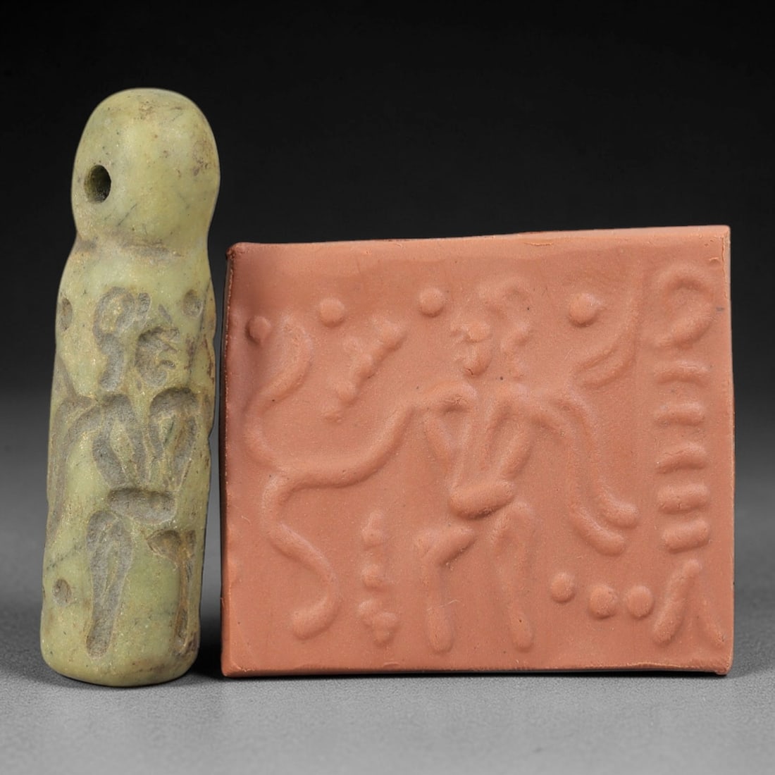 Ancient Serpentine Cylinder Seal - Mesopotamian, 85FX: Carved from serpentine, this cylinder seal follows the classic cylindrical form of ancient Mesopotamian administrative and ritual artifacts. Attributed to the Bronze Age Mesopotamian cultures, this se