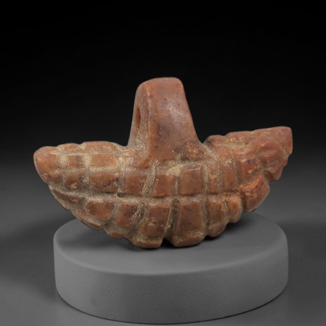 Ancient Red Stone Pendant - Egyptian Style Figurine, 82AG: Carved from red stone, this ancient Egyptian-style pendant features a compact, stylized form with defined body details and a suspension hole at the top, indicating its use as a wearable amulet. The ca