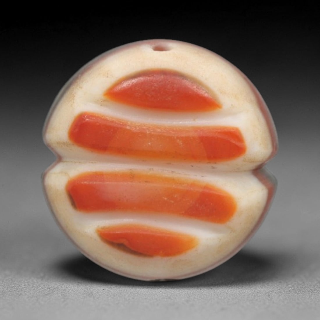 Antique Agate Double Stripe Bead - Central Asian Gemstone Pendant, 6ZW: Carved from banded agate with a creamy white base and bold orange-red horizontal inclusions, this bead features a symmetrical double-stripe motif with a subtle central indentation, creating a mirrored
